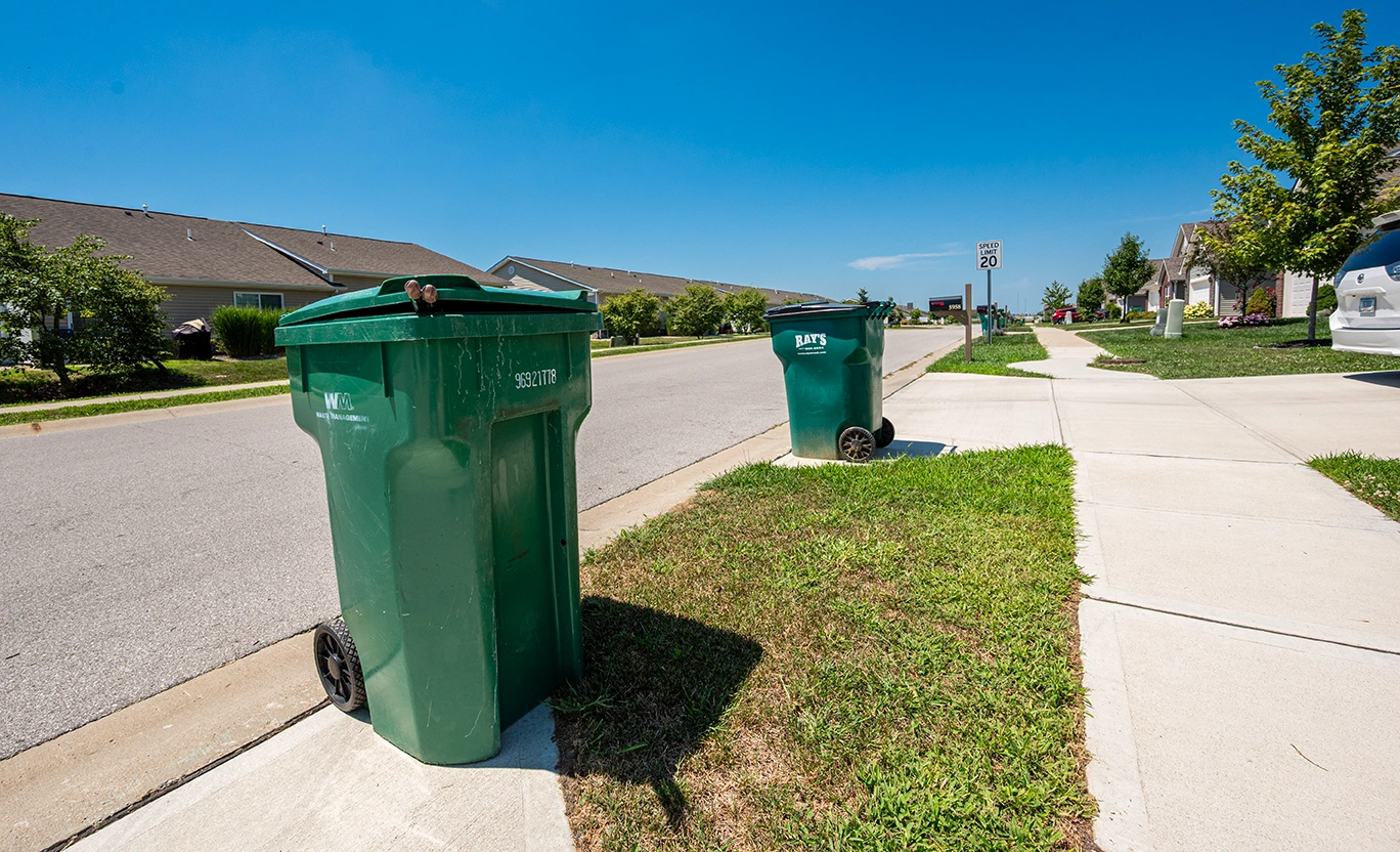 Hide trash cans in garage for your home listing photo session. 46 Photo